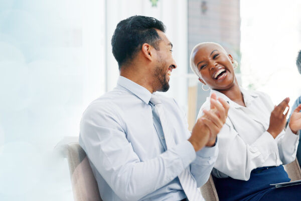 Finance leaders receiving mentorship and guidance—symbolizing executive-level CFO coaching for emerging talent and in-house development